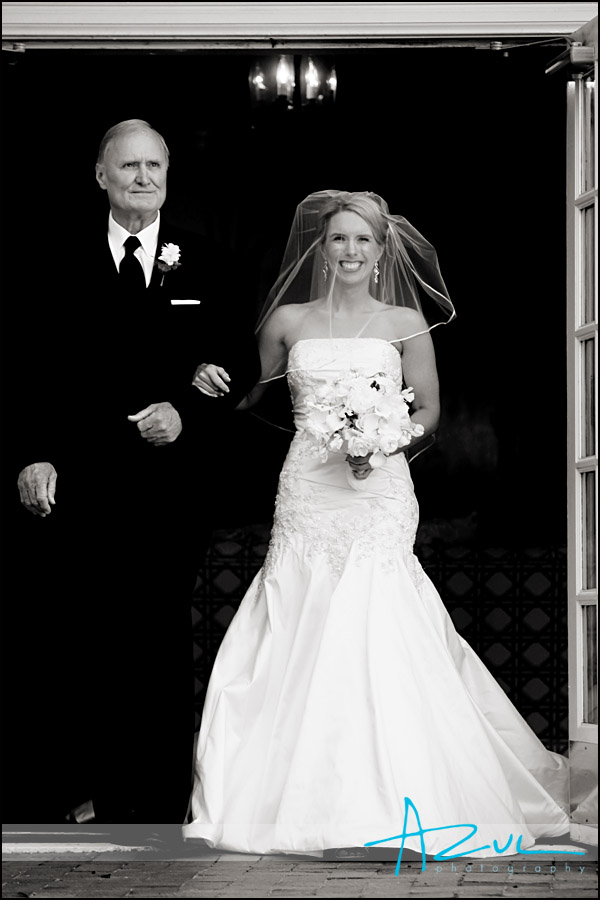 Wedding photograph of the father and the bride in the Bryan Courtyard in Chapel Hill.