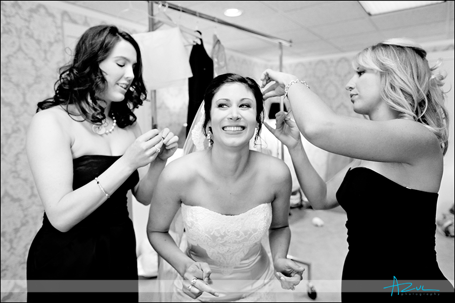 Getting ready photography for wedding with the happy bride in Raleigh NC