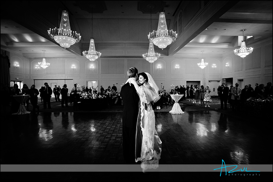 Stunning wedding day photographer lighting at reception in Raleigh
