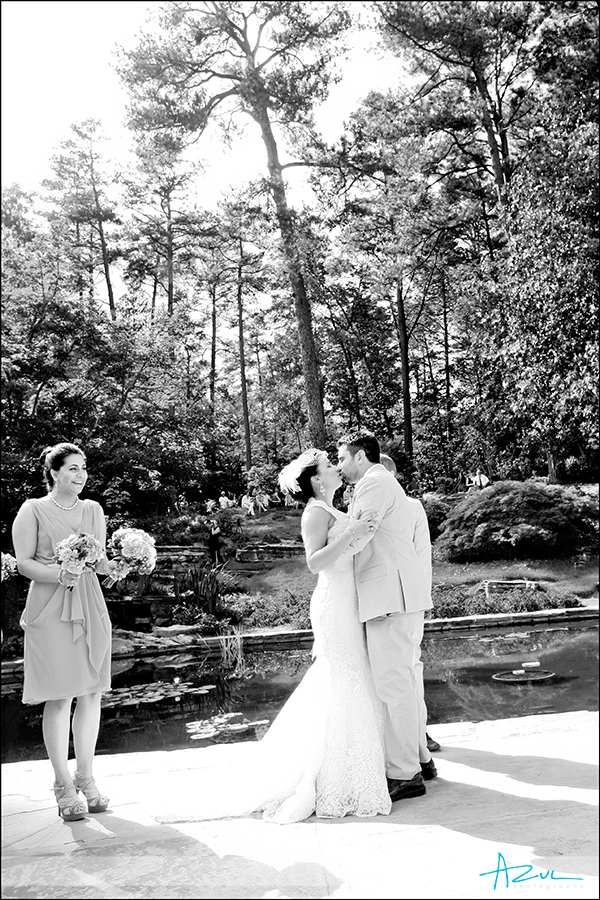 Kissing at the ceremony in Duke Gardens
