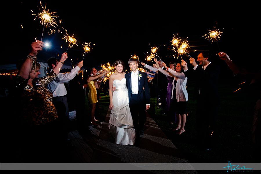 Wedding day exit with sparklers in the Outerbanks Whalehead Club NC
