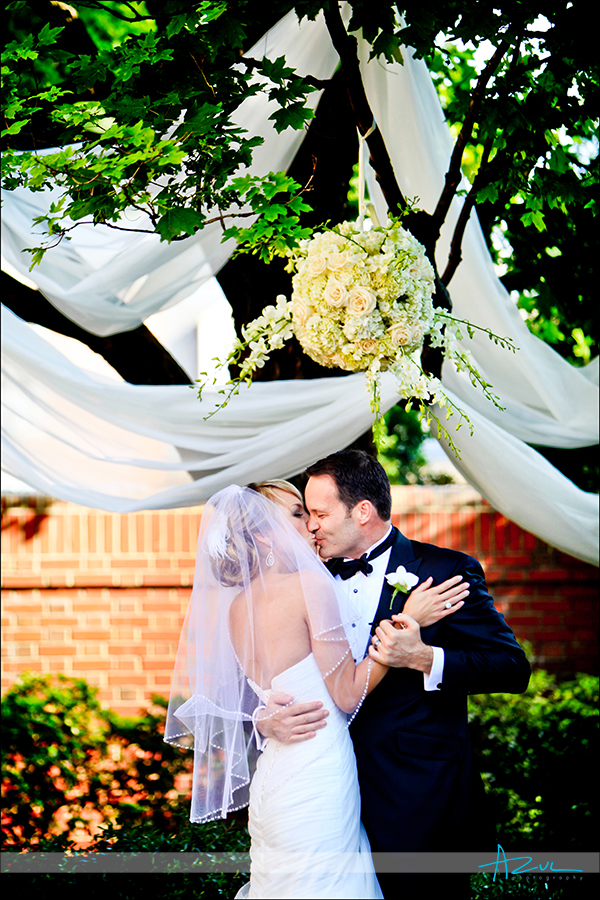 Carolina Inn wedding day kiss Bryant Courtyard Chapel Hill NC