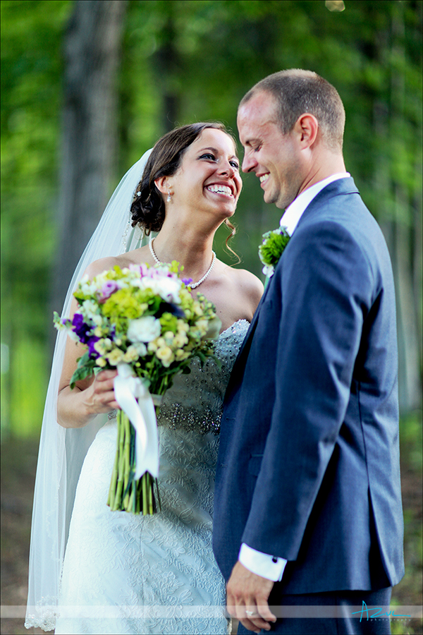 Cute creative wedding day portrait of the bride and groom at Lake Lure NC