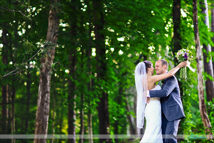 Happy bride & groom during portraits after a beautiful ceremony at Lake Lure NC