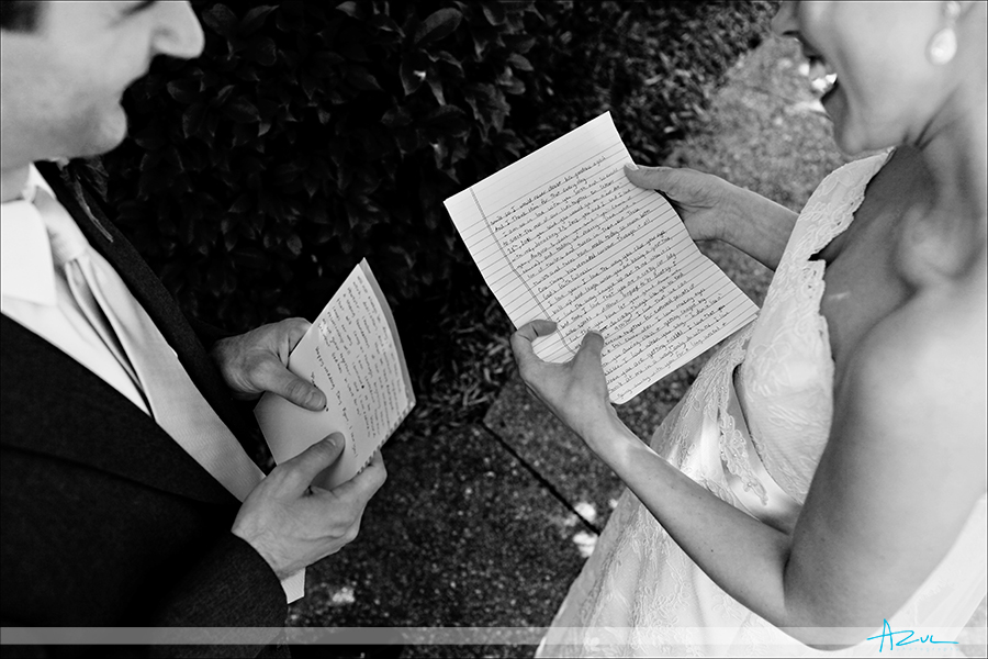 Photography of bride and groom letter exchange on wedding day Raleigh NC