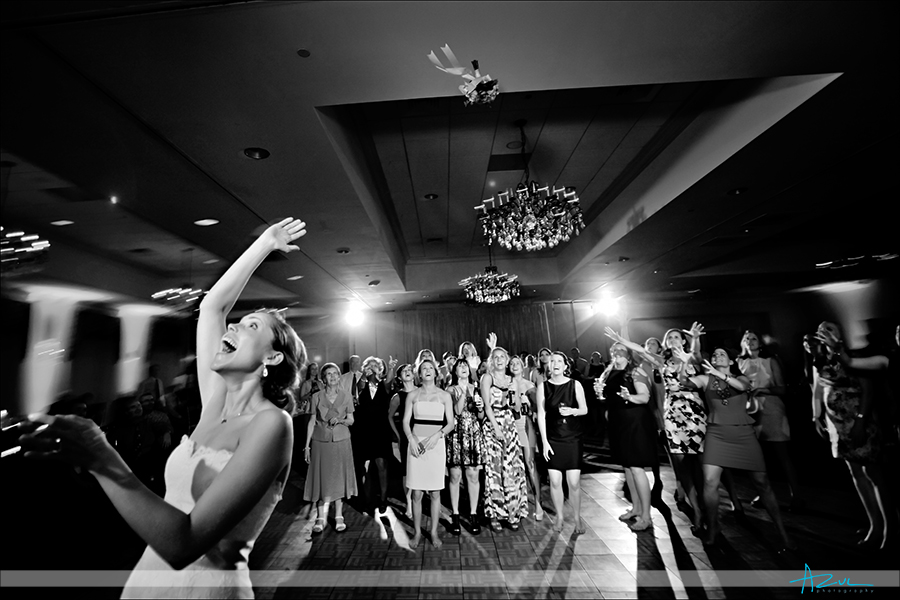 dynamic bouquet toss photography at Raleigh NC Brier Creek Country Club