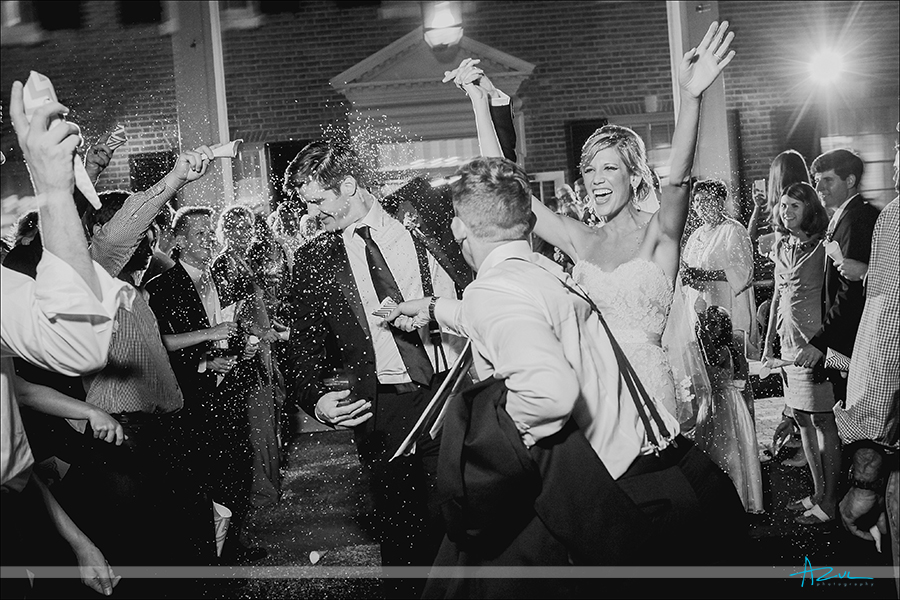 Best wedding reception exit photography with confetti snow in Chapel Hill NC