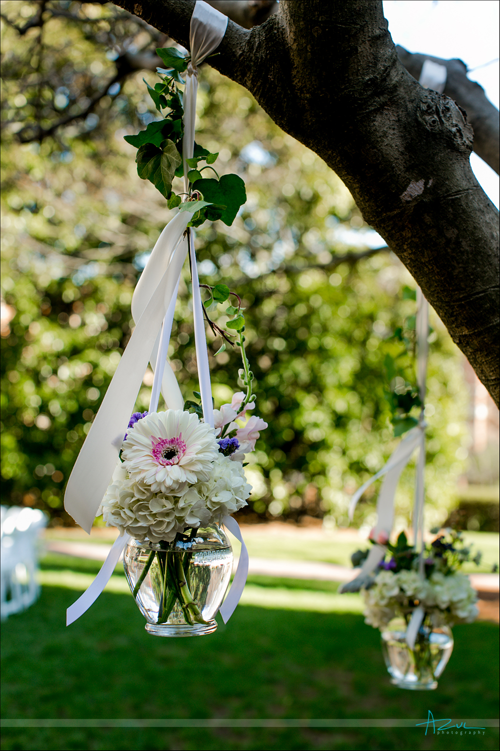 Beautiful wedding day florals hanging from trees, Chapel Hill NC