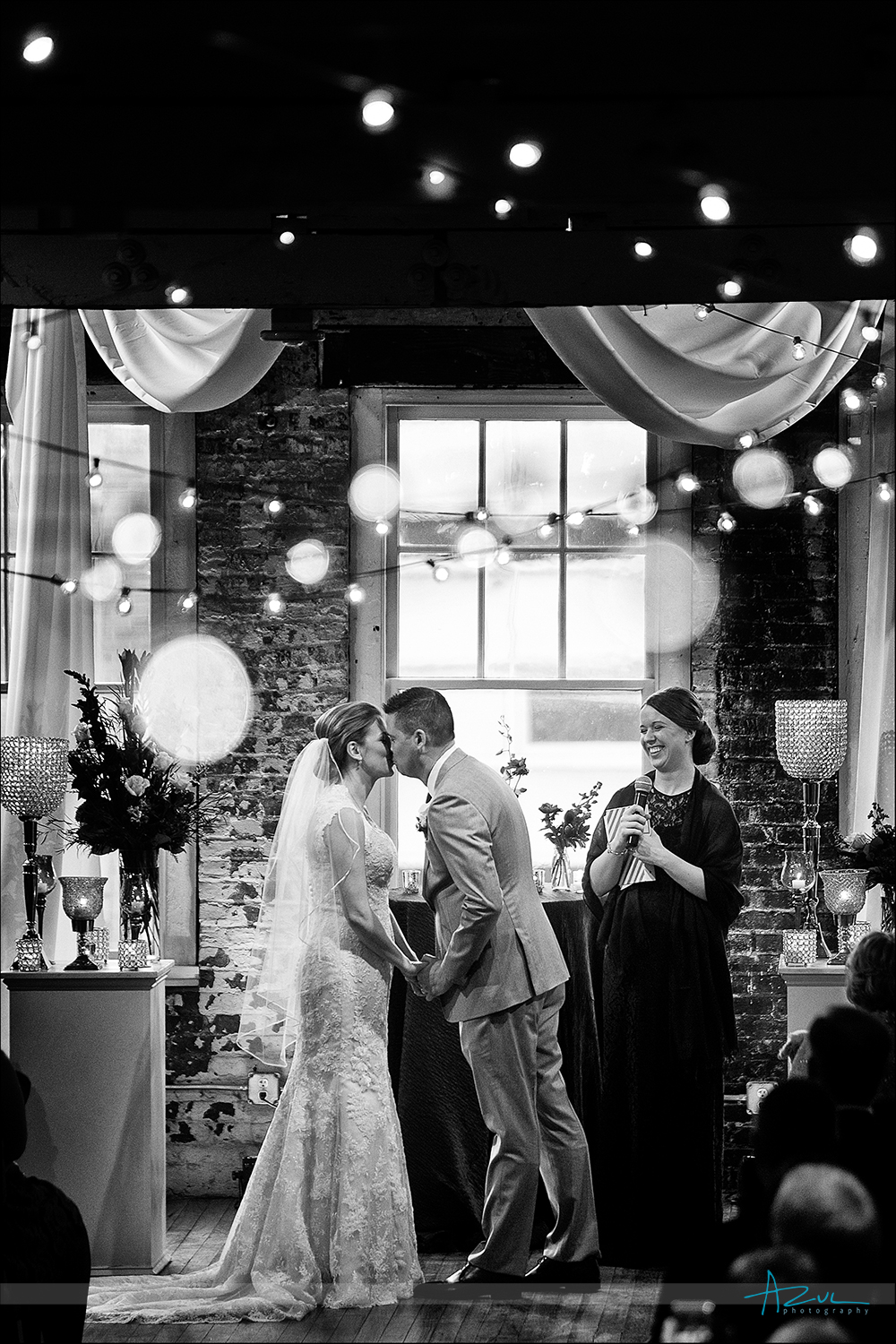 Raleigh Wedding Photographer kiss at The Stockroom, Raleigh NC
