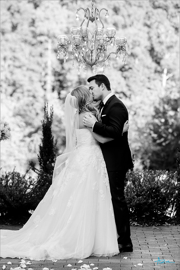 Best advice from this NC wedding photographer on the ceremony kiss is to hold her and kiss longer than you think.