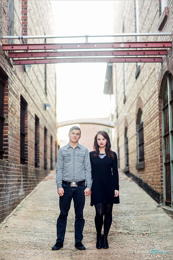 Engagement portrait photography of the couple in downtown Raleigh