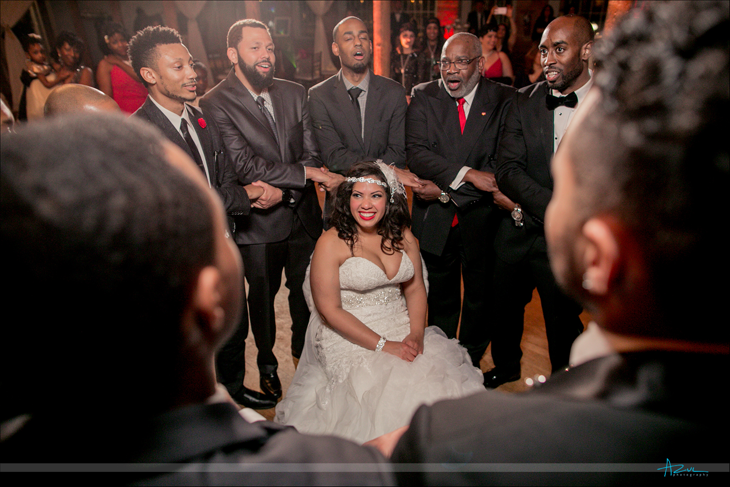 Fraternity tradition is to sing to the bride while at the reception located at The Cotton Room