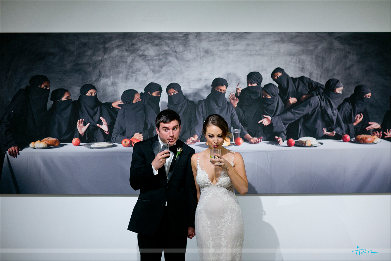 Fun wedding day B&G portrait with museum art while at 21c Museum & Hotel in Durham