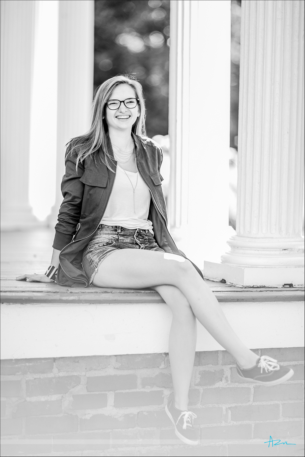 Having a great time during her senior portrait session in Raleigh NC.